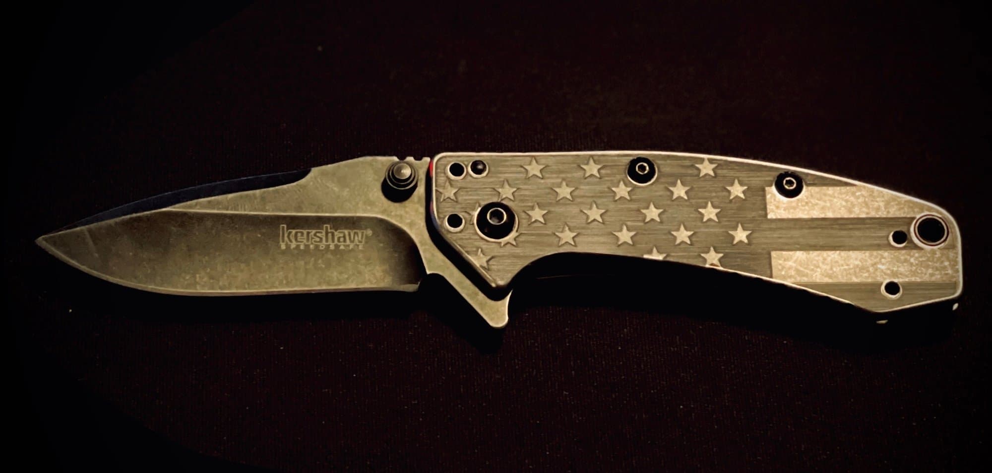 Precision laser-engraved stars pattern on Kershaw knife handle