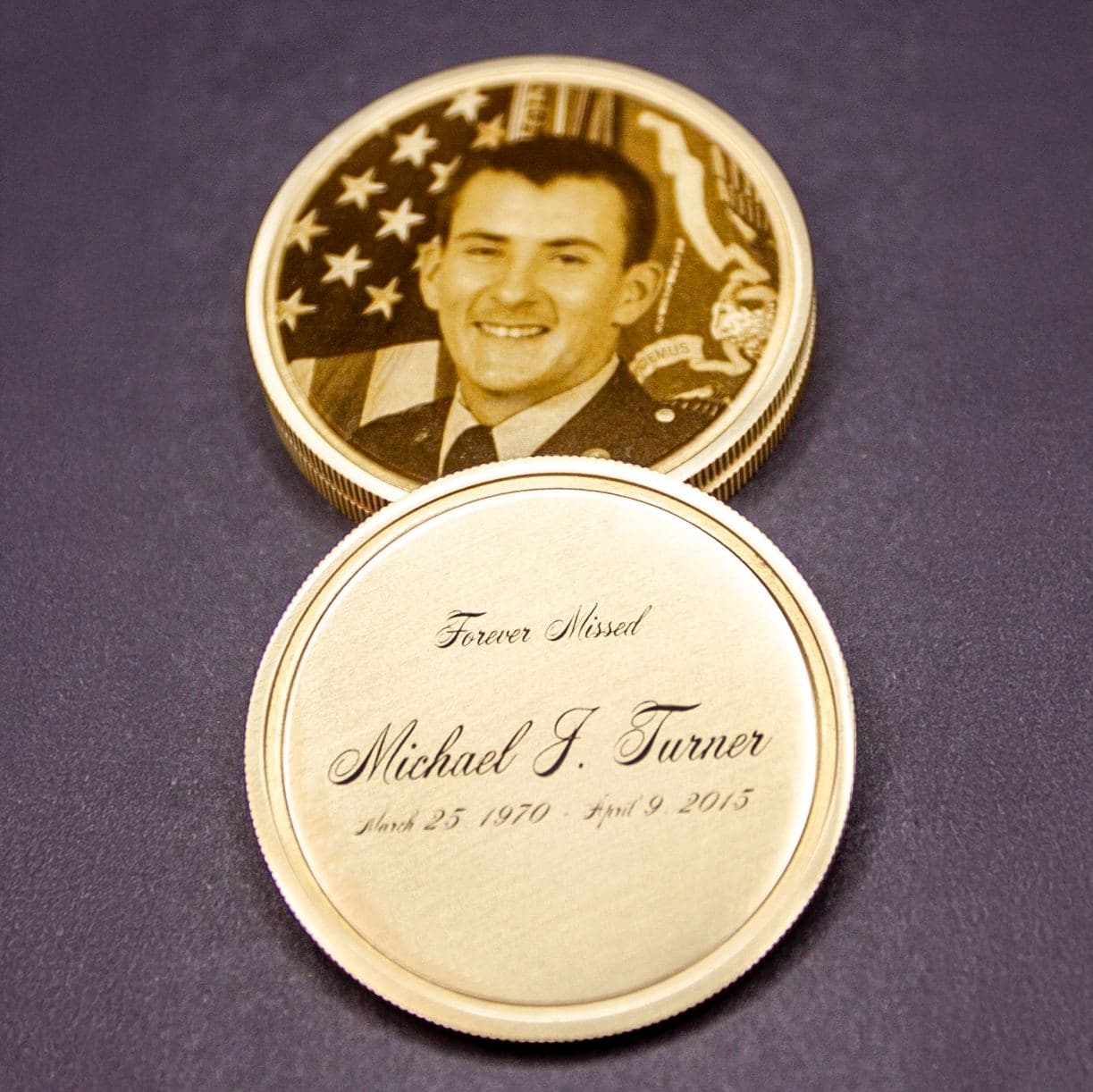 Custom memorial coin with photo-realistic portrait engraving and dedication text for Michael J. Turner