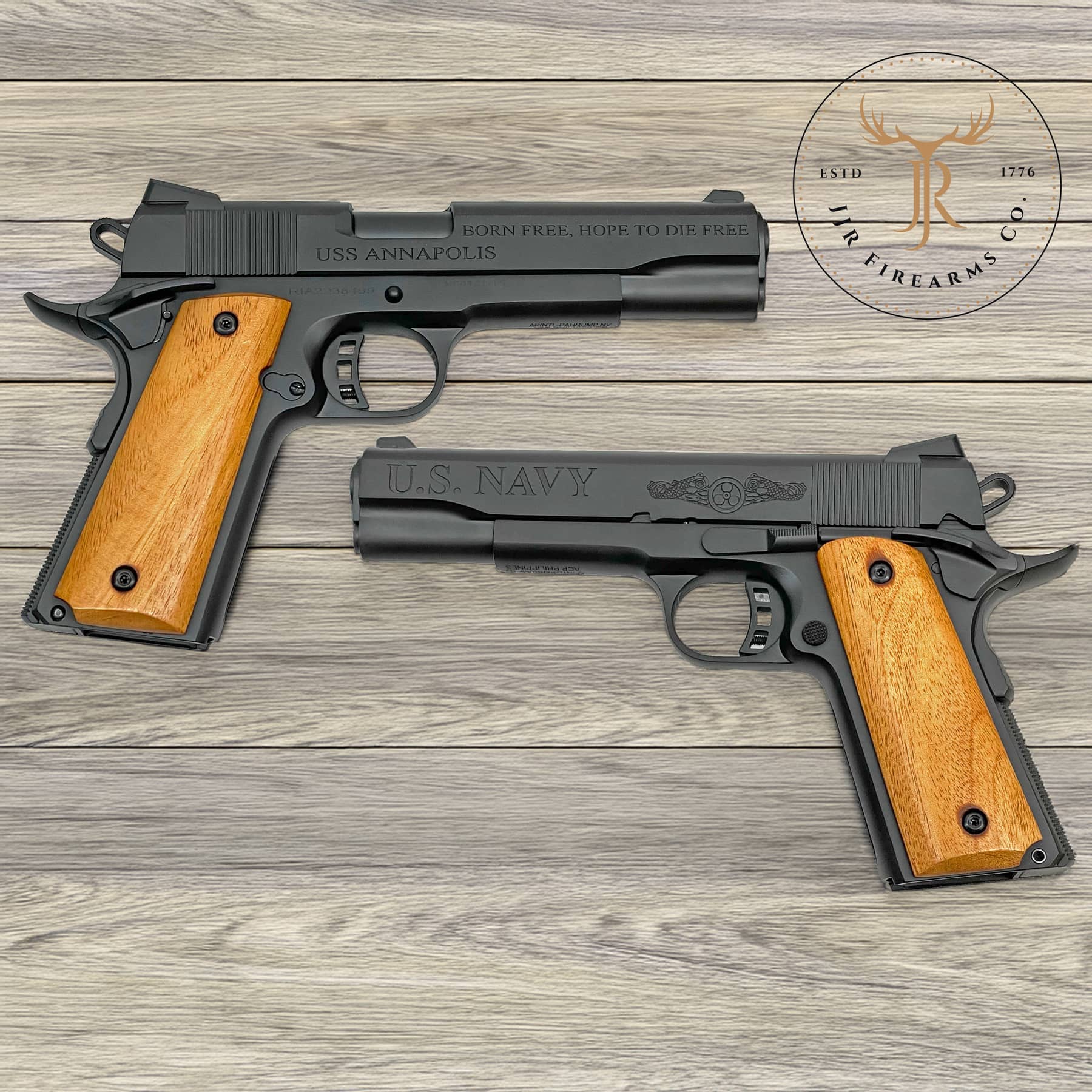 Custom 1911 pistol shown from both sides with matte black Cerakote finish and laser engraved U.S. Navy USS Annapolis military tribute designs